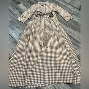 Brown plaid long dress with belt attached.